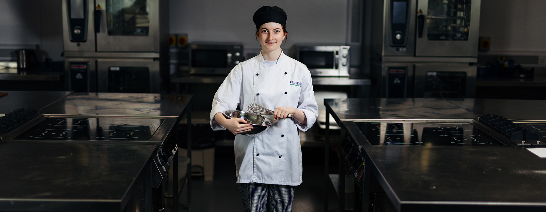 Cookery student in Riseholmes professional kitchens