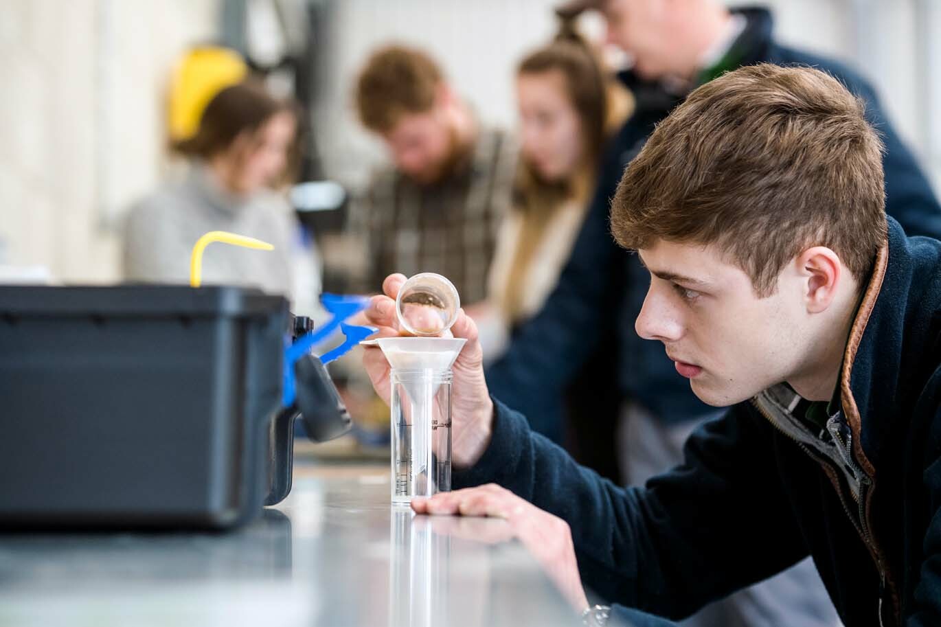 Agriculture degree student soil testing in the Centre for Precision Agriculture