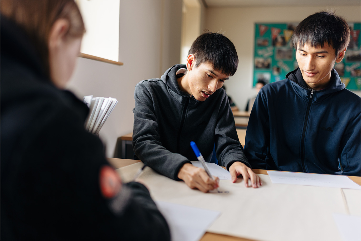 Business students working together