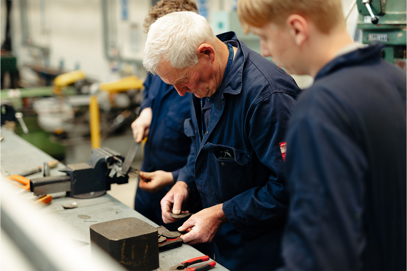 Engineering students being taught by expert tutors