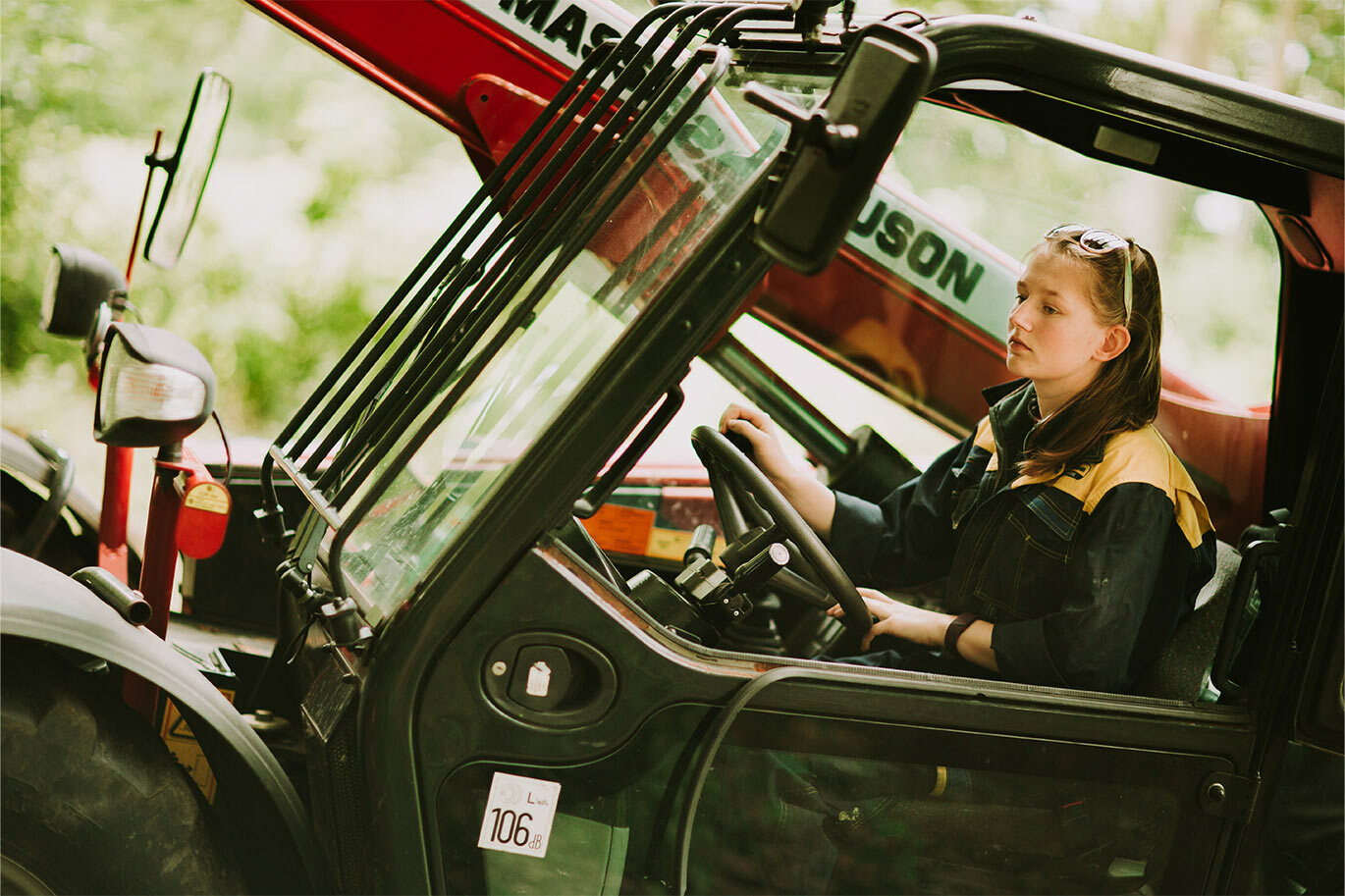 Female agriculture student tractor driving