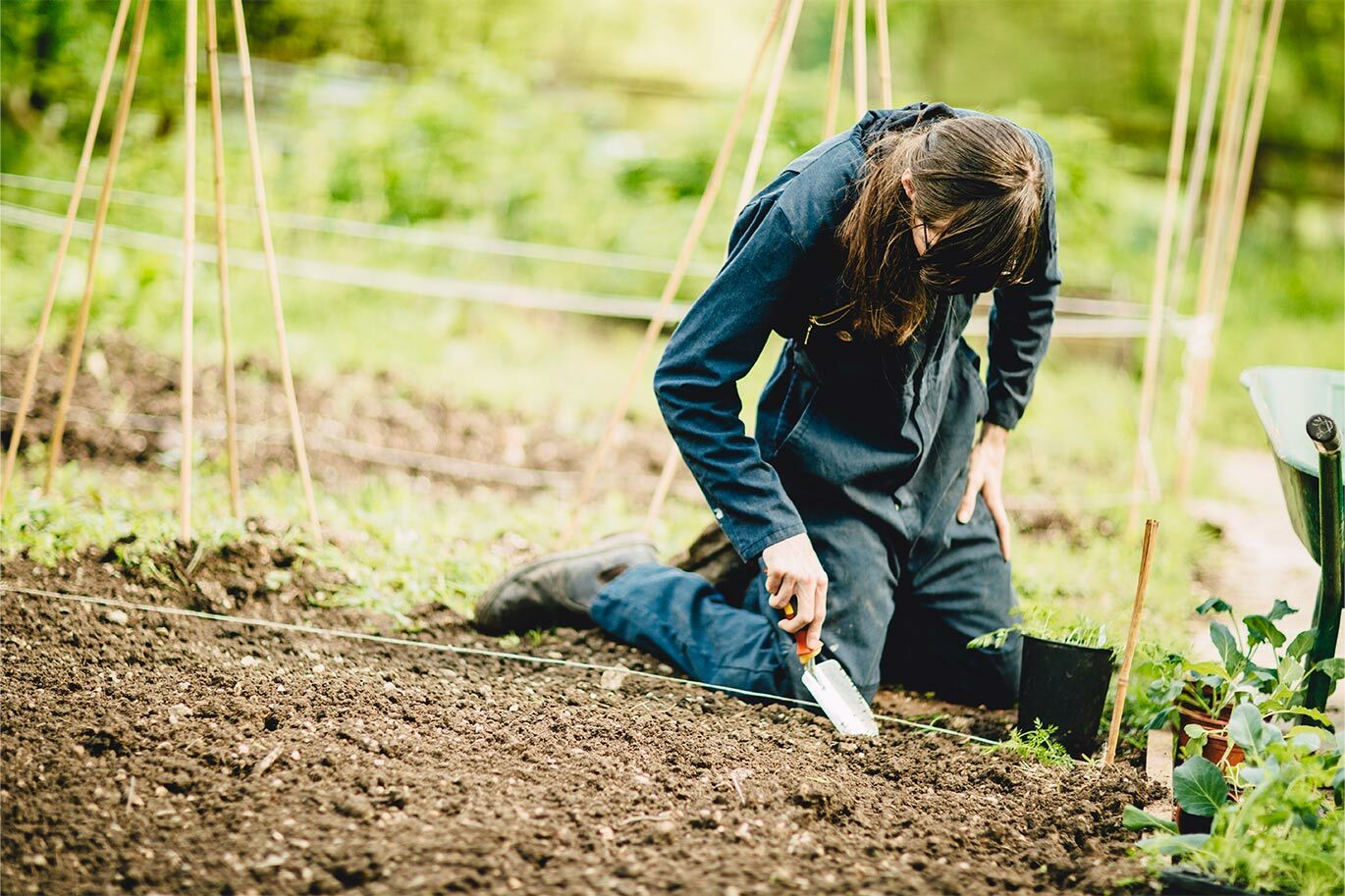 Horticulture student digging