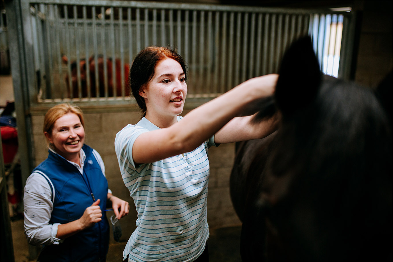 Student plaiting horses mane