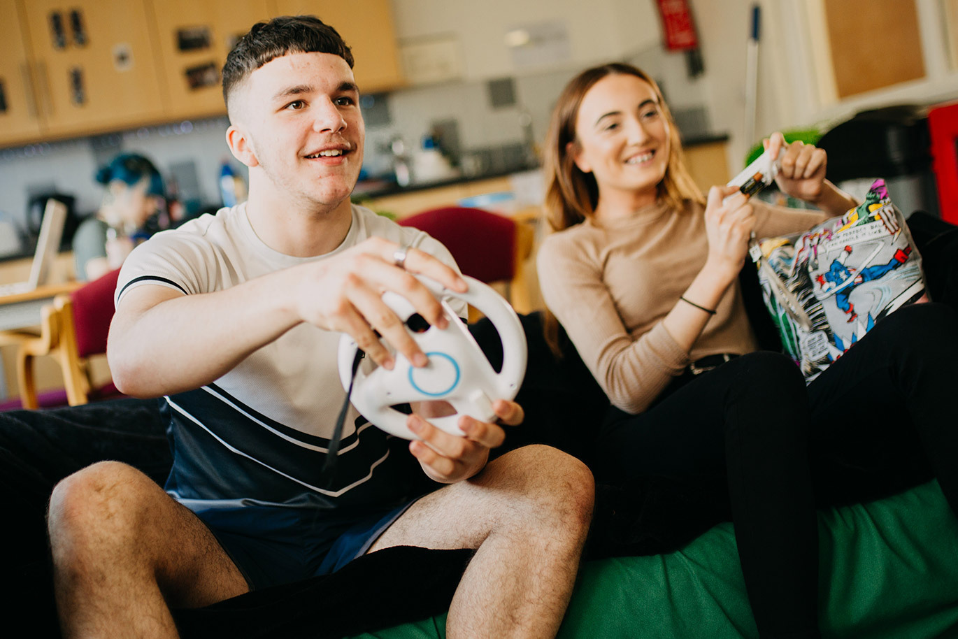 Students playing game in Riseholmes student accommodation